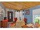 Cozy living area featuring a wooden ceiling, table and cabinets at 5400 Kings Camp Rd Se #C1 Se Rd, Acworth, GA 30102