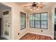 Bright dining area with wood floors and sunny windows at 6790 India Ln, Cumming, GA 30041