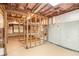 Unfinished basement with exposed framing, offering potential for customization and expansion at 90 Camden Woods Pl, Dallas, GA 30157