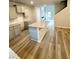 Kitchen featuring a center island with granite countertops at 123 Deer Xing, Temple, GA 30179