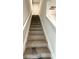 Carpeted staircase with white trim at 123 Deer Xing, Temple, GA 30179