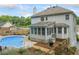 A two-story home with a beautiful pool and plenty of outdoor space for entertaining and enjoying the outdoors at 1482 Pinebark Ct., Grayson, GA 30017