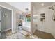 Modern bathroom with walk-in shower, soaking tub, and stylish tile at 1482 Pinebark Ct., Grayson, GA 30017