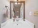 Bathroom with a large vanity mirror, ample counter space, and neutral wall color at 1482 Pinebark Ct., Grayson, GA 30017