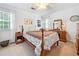 Cozy bedroom with natural light, soft carpet, neutral walls, and traditional furnishings at 1482 Pinebark Ct., Grayson, GA 30017