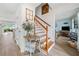 Welcoming entryway with hardwood floors and a view into the living room at 1482 Pinebark Ct., Grayson, GA 30017