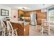 Kitchen with wooden cabinets, granite countertops, and stainless steel appliances at 1482 Pinebark Ct., Grayson, GA 30017