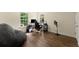 Home office features hardwood flooring and a bean bag, plus an office setup at 3235 Avondale Pkwy, Powder Springs, GA 30127