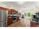 Well-equipped kitchen with stainless steel appliances and wooden cabinetry, offering modern convenience at 3235 Avondale Pkwy, Powder Springs, GA 30127