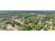 Aerial view of a neighborhood surrounded by lush green trees and mature landscaping at 5705 Cannonero Dr, Alpharetta, GA 30005