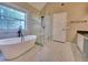 Beautiful bathroom with a standalone tub and large walk in shower at 5705 Cannonero Dr, Alpharetta, GA 30005