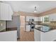 Bright kitchen featuring stainless steel appliances, and hardwood flooring at 5705 Cannonero Dr, Alpharetta, GA 30005