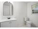 Bright bathroom with a large mirror, vanity, and a tile floor at 1780 Kinridge Rd, Marietta, GA 30062