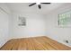 Cozy bedroom with hardwood floors, closet, and natural light at 1780 Kinridge Rd, Marietta, GA 30062