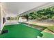 Spacious covered patio with a view of the backyard with a storage building at 2620 Matlin Way, Buford, GA 30519