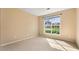 Bedroom with plush carpet, neutral walls, and large window for lots of light at 2620 Matlin Way, Buford, GA 30519