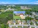 This home features a lush green lawn, a brick facade, and an attached two-car garage at 2620 Matlin Way, Buford, GA 30519