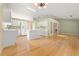Bright kitchen with hardwood floors, white cabinetry, and modern appliances, perfect for cooking at 2620 Matlin Way, Buford, GA 30519