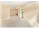 Open living room includes a fireplace, plush carpeting, and neutral paint at 2620 Matlin Way, Buford, GA 30519