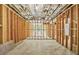 Unfinished basement featuring wood framing, open layout, and concrete flooring at 3298 Alcovy Club Ct, Dacula, GA 30019