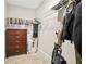 Functional closet with built-in shelving, rod for hanging clothes, and a dresser, providing ample storage and organization at 3298 Alcovy Club Ct, Dacula, GA 30019