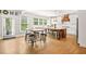 Bright kitchen with island seating, stylish pendant lighting, and stainless appliances at 3298 Alcovy Club Ct, Dacula, GA 30019