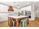 A bright kitchen with a large center island and stainless appliances at 3298 Alcovy Club Ct, Dacula, GA 30019