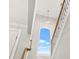 Staircase featuring an arched window with abundant natural light at 3298 Alcovy Club Ct, Dacula, GA 30019