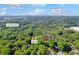 Aerial view of a community, with a picture of the home highlighted within the image at 4331 E Kings Point Circle, Dunwoody, GA 30338