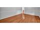 A spacious bedroom showcases gleaming hardwood floors, neutral paint, and updated trim at 4331 E Kings Point Circle, Dunwoody, GA 30338