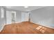 Bedroom with hardwood floors has natural light and access to another room at 4331 E Kings Point Circle, Dunwoody, GA 30338