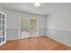 Living room area with access to a deck and has hardwood floors at 4331 E Kings Point Circle, Dunwoody, GA 30338