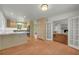 The living room leads into a kitchen with granite countertops and stainless appliances at 4331 E Kings Point Circle, Dunwoody, GA 30338