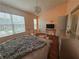 Bright bedroom with vaulted ceilings, large windows, and stylish decor at 5536 Strathmoor Manor Cir, Lithonia, GA 30058