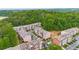 Townhome community showcases well-maintained brick facades and lush green landscaping at 7812 Kiverton Pl, Atlanta, GA 30350