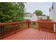 Wood deck overlooking the green lawn and neighboring townhomes at 7812 Kiverton Pl, Atlanta, GA 30350