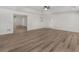 An airy bedroom, showcasing updated flooring and fresh paint at 117 Spring St, Stockbridge, GA 30281