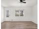 Bright living room with a new front door and modern paint is move-in ready at 117 Spring St, Stockbridge, GA 30281