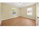 Bright bedroom with hardwood floors, neutral walls, and natural light at 2703 Flagstone Se Dr, Atlanta, GA 30316
