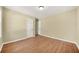 Comfortable bedroom featuring neutral walls, hardwood floors, and ample closet space at 2703 Flagstone Se Dr, Atlanta, GA 30316