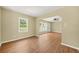 Spacious living room with hardwood floors and natural light from large windows at 2703 Flagstone Se Dr, Atlanta, GA 30316