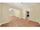 Open living room featuring hardwood floors leading to the kitchen at 2703 Flagstone Se Dr, Atlanta, GA 30316