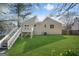 This home features a lush backyard at 3813 Nowlin Nw Rd, Kennesaw, GA 30144