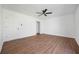 Large bedroom with ceiling fan and ample closet space at 3813 Nowlin Nw Rd, Kennesaw, GA 30144