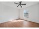 Clean bedroom with a ceiling fan and bright window at 3813 Nowlin Nw Rd, Kennesaw, GA 30144
