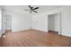 Spacious bedroom features a ceiling fan and ensuite bathroom at 3813 Nowlin Nw Rd, Kennesaw, GA 30144