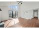 Sunlit living room boasts vaulted ceiling and large windows at 3813 Nowlin Nw Rd, Kennesaw, GA 30144