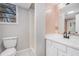 Bathroom features a single sink vanity, toilet, and stand up shower at 441 Village Way, Lawrenceville, GA 30046
