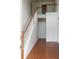 Bright foyer with hardwood floors and a staircase leading to the second level at 442 John Stewart Pl, Suwanee, GA 30024