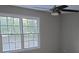 Bedroom featuring a window and a ceiling fan at 1947 Kensington High Sw St, Lilburn, GA 30047